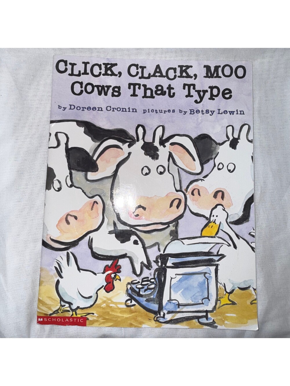 Click, Clack, Moo: Cows That Type by Doreen Cronin Scholastic paperback edition.